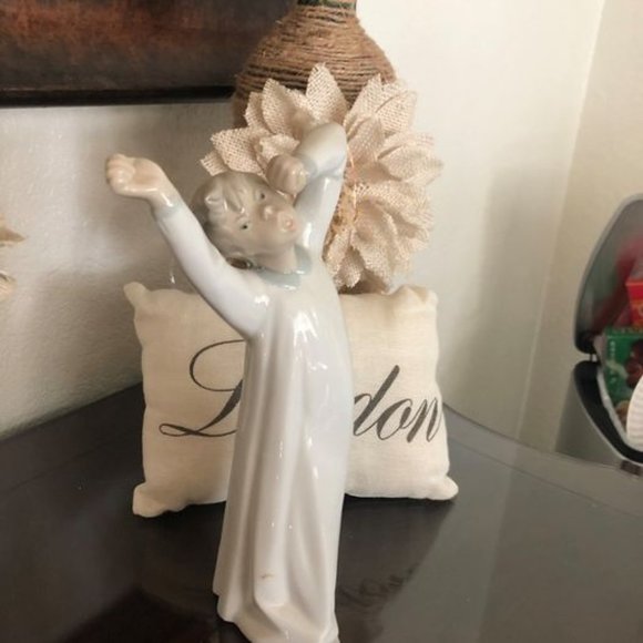 Lladro Other Lladro Figurine Of Boy Yawning Poshmark
